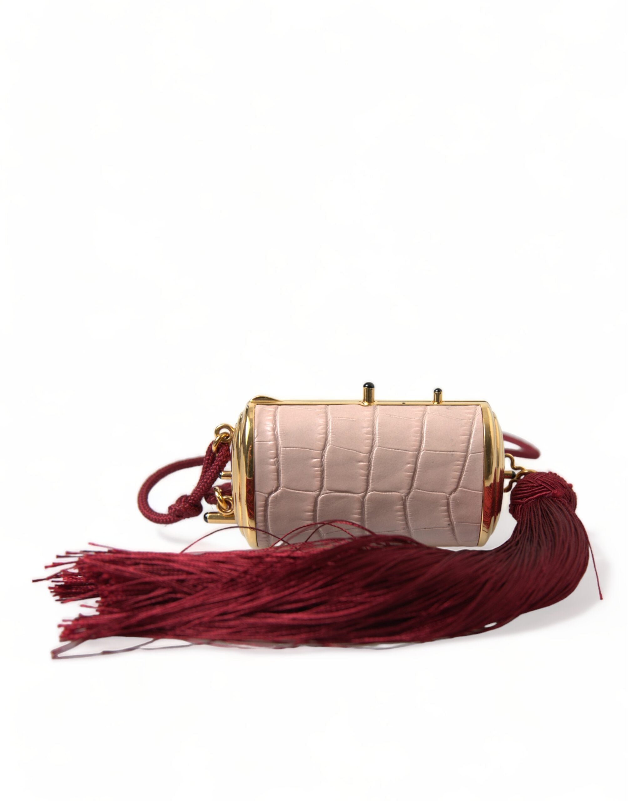 Trousse à maquillage Dolce & Gabbana en cuir exotique rose avec miroir mini et tassels élégants.