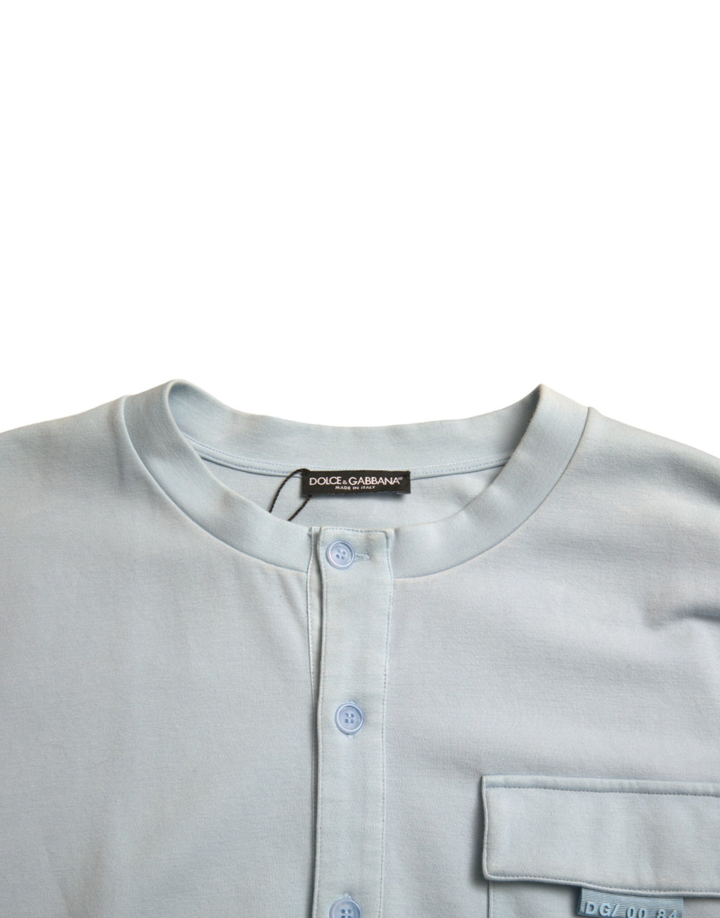 Pull-over en coton Dolce & Gabbana Light Blue avec boutons, style décontracté et élégant, visible en détail dans l’image.