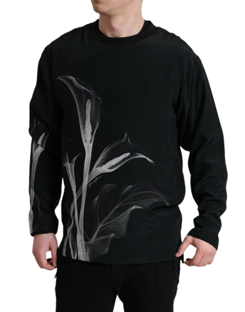 Pull-over Dolce & Gabbana noir à motif floral, col rond, en tissu doux et confortable, avec design élégant.