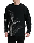 Pull-over Dolce & Gabbana noir à motif floral, col rond, en tissu doux et confortable, avec design élégant.