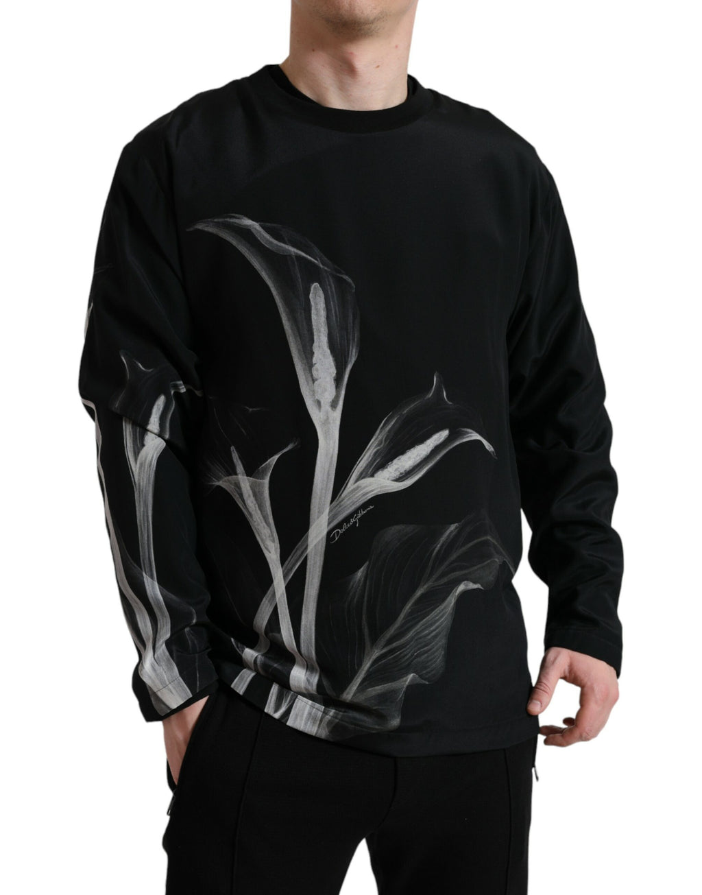 Pull-over noir Dolce & Gabbana à motif floral, col rond et style élégant, vue de face.