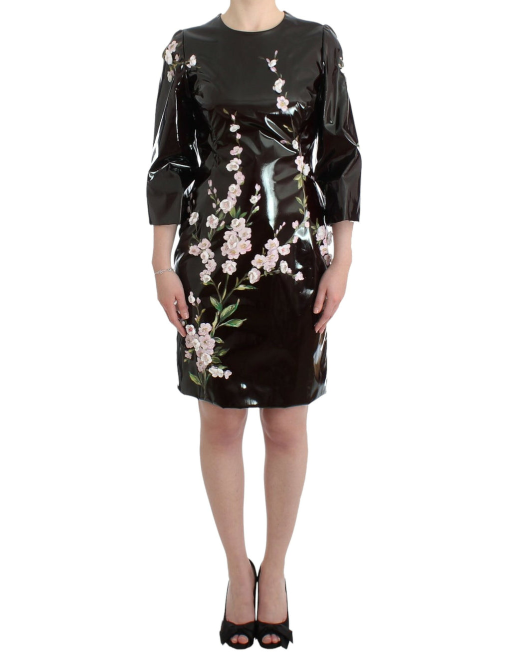Robe noire en cuir brillant avec fleurs peintes à la main de Dolce & Gabbana, élégante et sophistiquée.