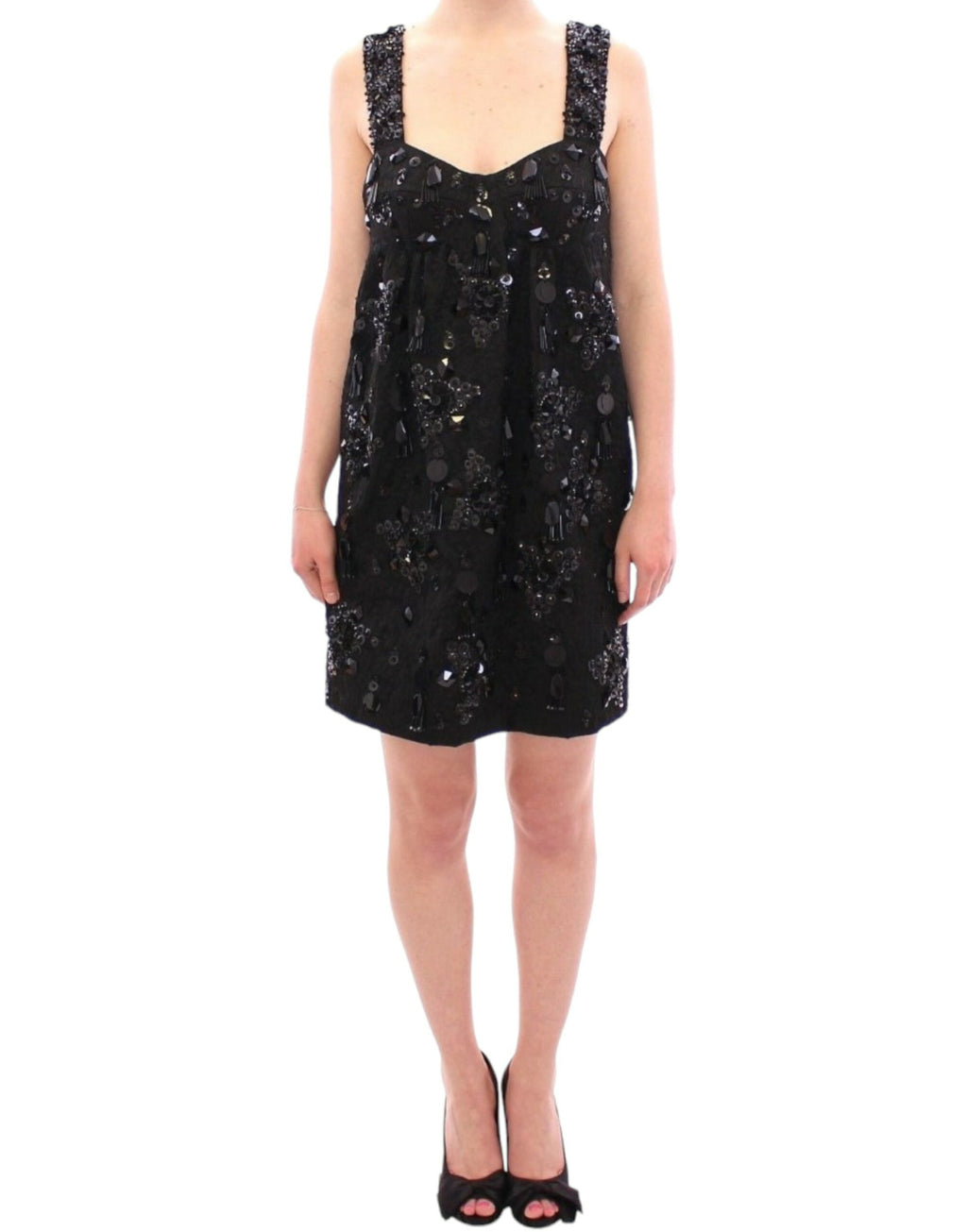Robe noire Dolce & Gabbana avec motifs floraux en cristaux, élégante et sophistiquée, portée en soirée.