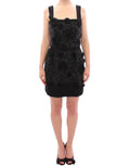 Robe noire Dolce & Gabbana à fleurs avec cristaux, élégante et ornée de détails floraux et brillants.
