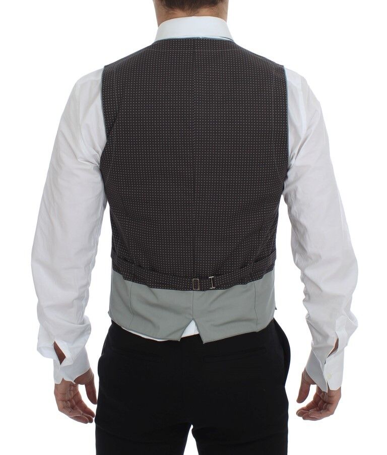 Gilet gris à pois Dolce & Gabbana, veste élégante en tissu léger, avec motif à pois sur fond gris.