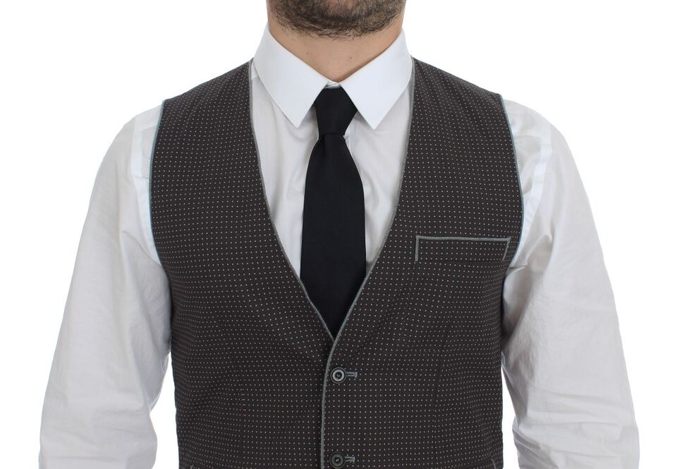 Veste gilet Dolce & Gabbana à pois gris, vêtement élégant pour homme ou femme, en tissu léger avec motif à pois.