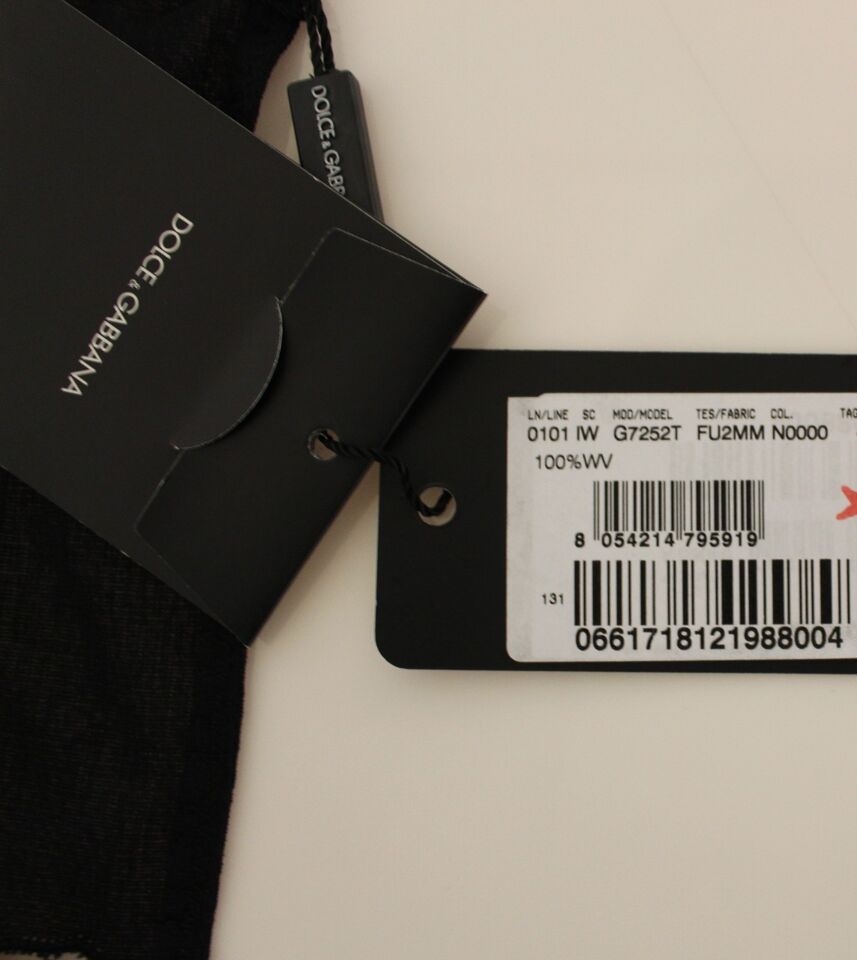 Gilet noir en laine Dolce & Gabbana, veste formelle élégante avec col et boutons, pour homme ou femme.