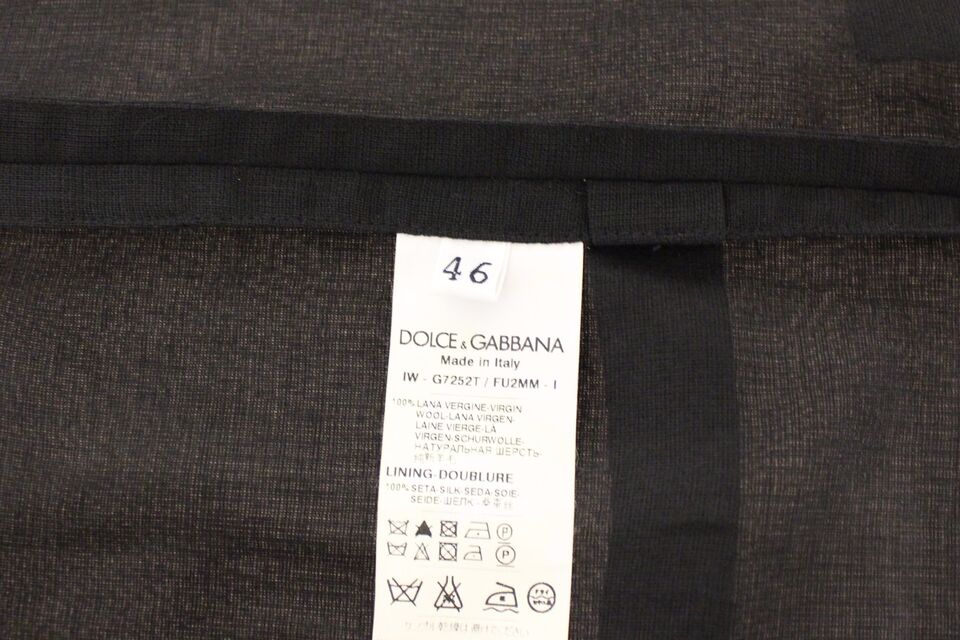 Gilet formel en laine noire de Dolce & Gabbana, veste élégante pour homme ou femme, avec coupe sophistiquée et détails raffinés.