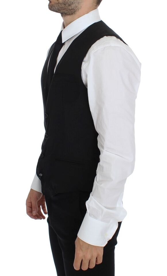 Gilet noir en laine de la marque Dolce & Gabbana, veste formelle élégante pour homme ou femme, détail classique et sophistiqué