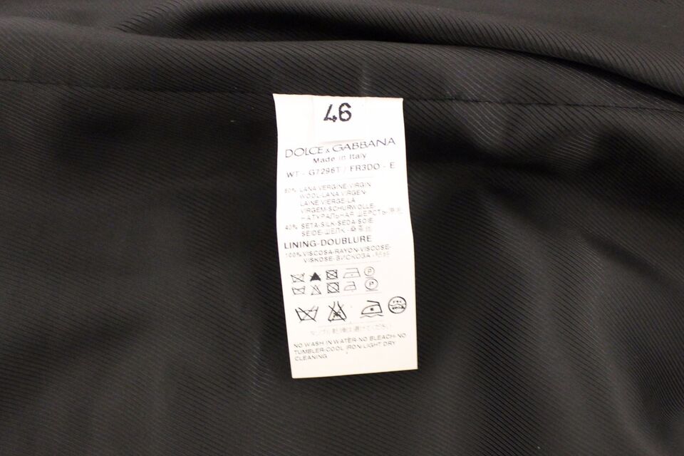 Gilet en laine et soie noire à rayures de Dolce & Gabbana, vestiaire élégant et sophistiqué pour femme.