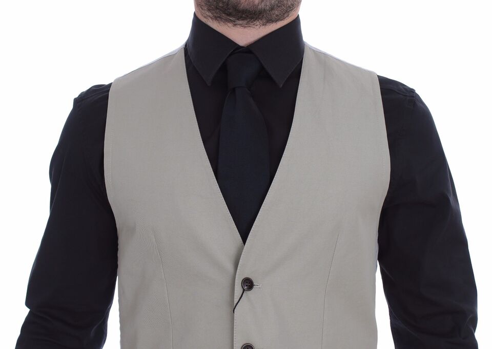 Gilet élégant en soie mélangée beige de Dolce & Gabbana, veste formelle pour homme ou femme, détail raffiné et sophistiqué
