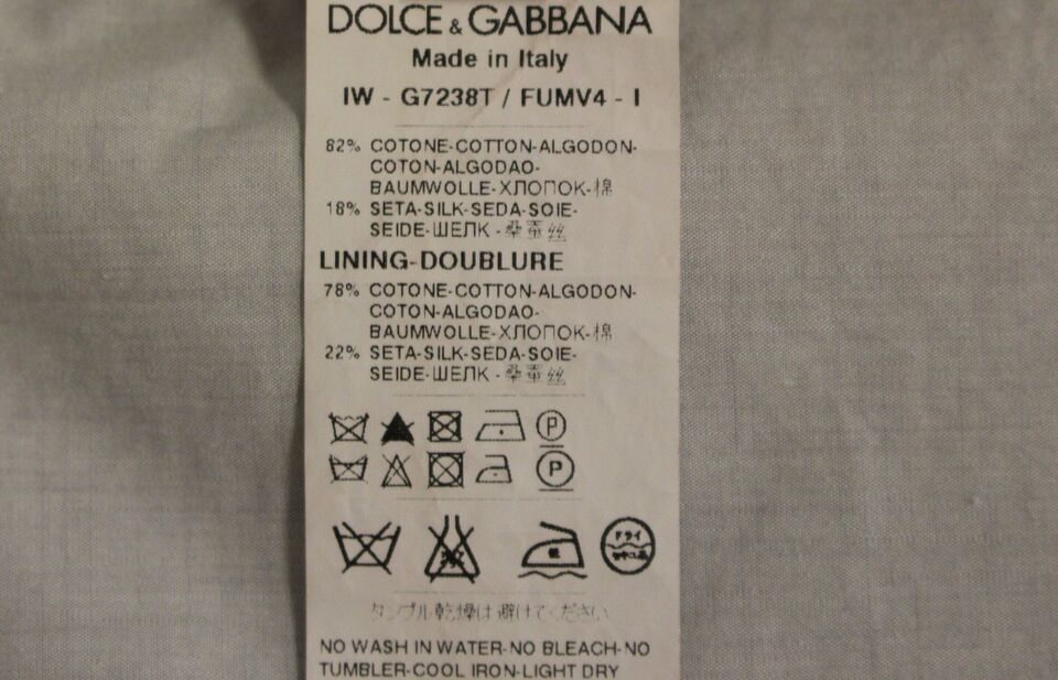 Robe beige en soie mélangée de Dolce & Gabbana, robe de soirée élégante avec gilet formel en tissu sophistiqué.