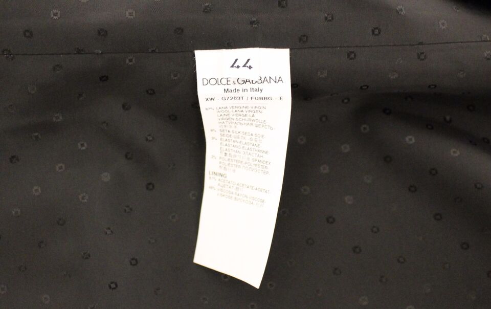 Gilet blazer noir en laine et soie Dolce & Gabbana, coupe ajustée, élégant, sans manches, détail classique.
