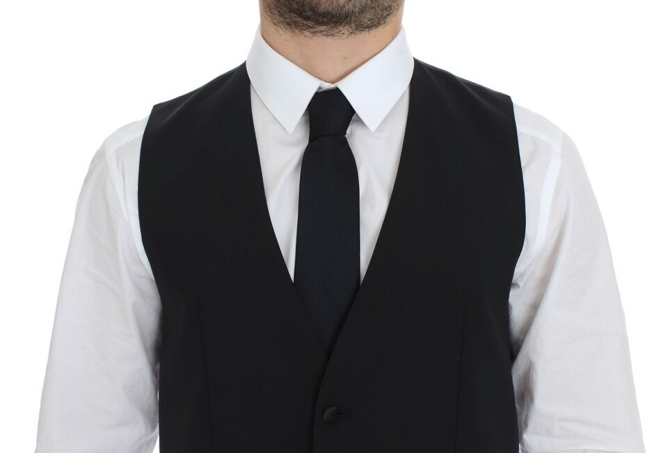 Veste blazer ajustée en laine et soie noire de Dolce & Gabbana, style élégant et sophistiqué pour femme.