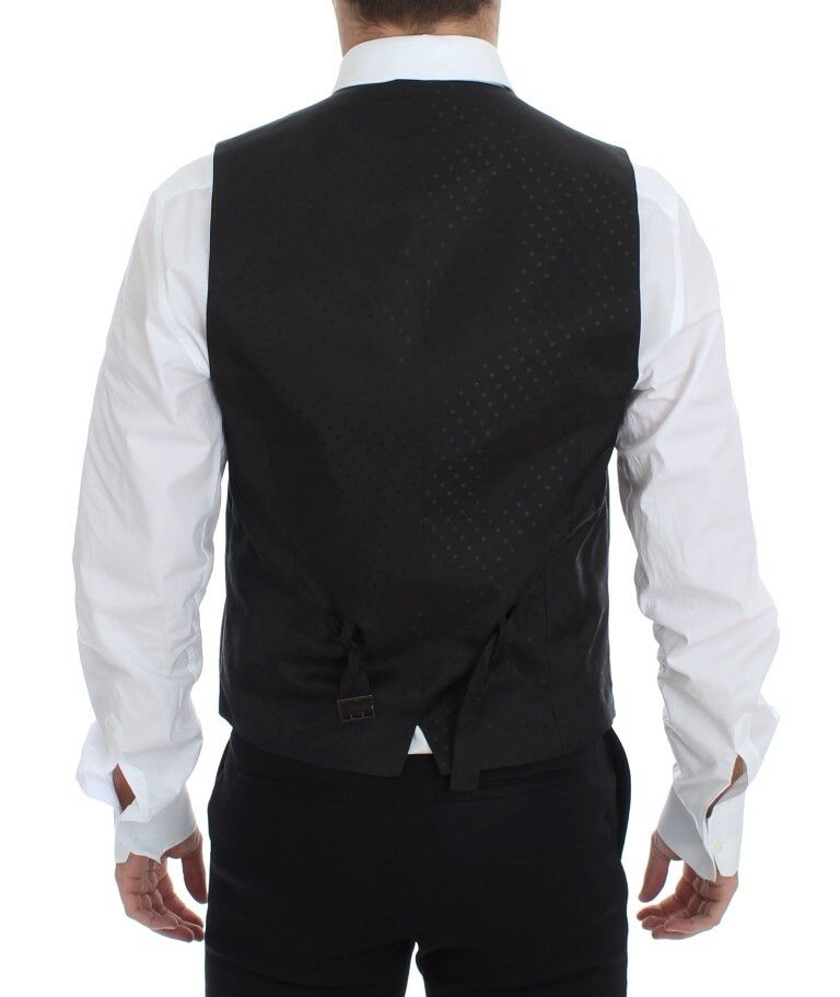 Gilet blazer en laine et soie noire Dolce & Gabbana, coupe ajustée, détails élégants, porté sur un mannequin.