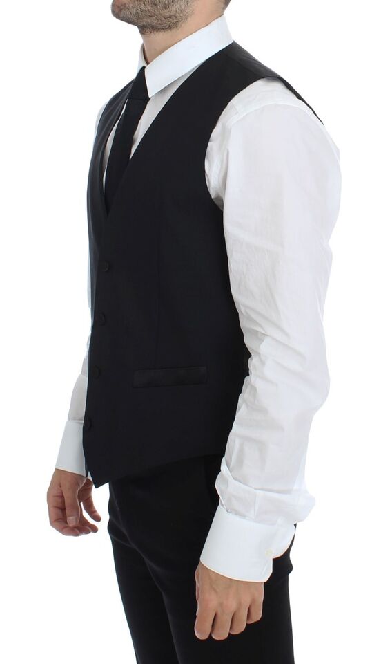Gilet blazer noir en laine et soie Dolce & Gabbana avec coupe ajustée et détails élégants, porté sur un mannequin.