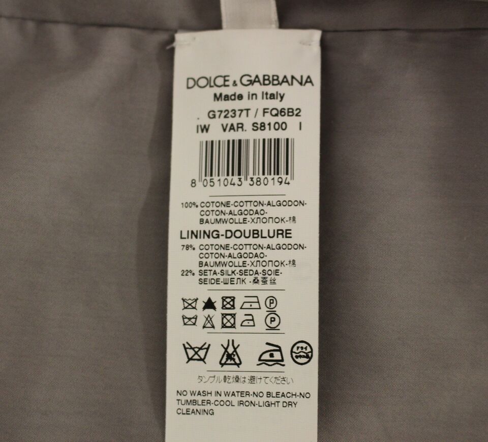 Gilet slim en coton gris de la marque Dolce & Gabbana avec boutons à l'avant, porté sur un mannequin.