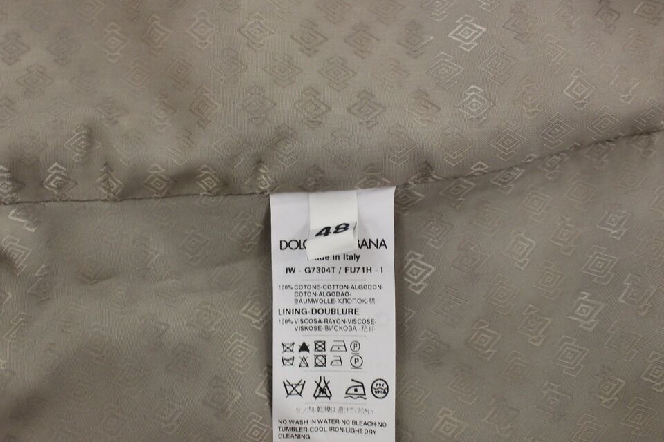 Veste blazer noire en coton Dolce & Gabbana, veste élégante et ajustée pour femme ou homme, vue de face.