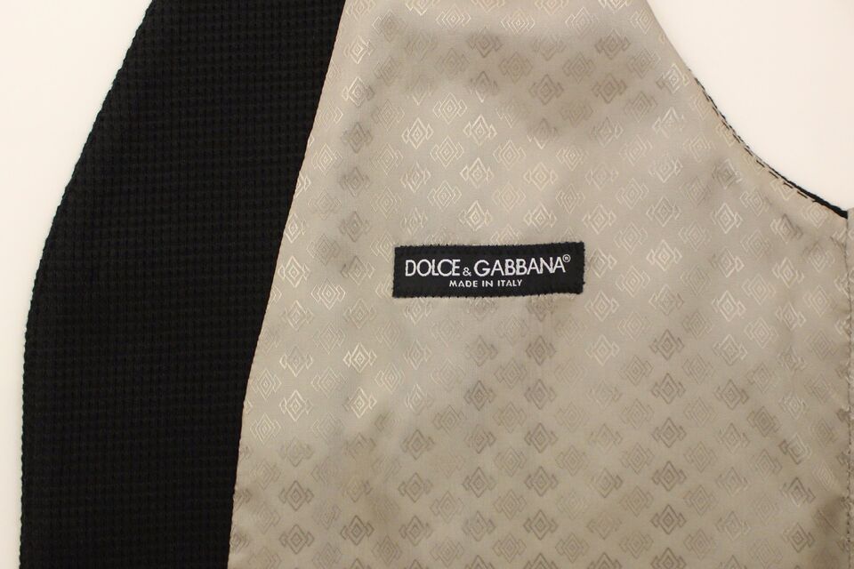 Veste sans manches Dolce & Gabbana en coton noir, blazer élégant pour femme, détail de design sophistiqué.
