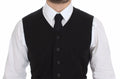 Gilet blazer noir en coton de la marque Dolce & Gabbana avec détails en lin, porté sur un mannequin.