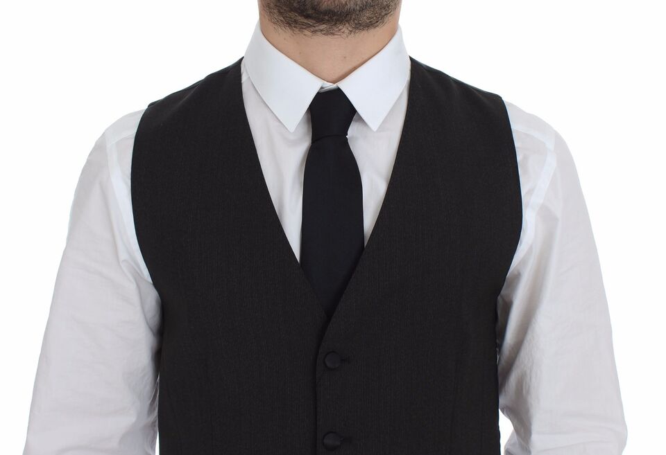 Veste blazer en laine gris stretch de Dolce & Gabbana, élégant et ajusté, pour un style sophistiqué.
