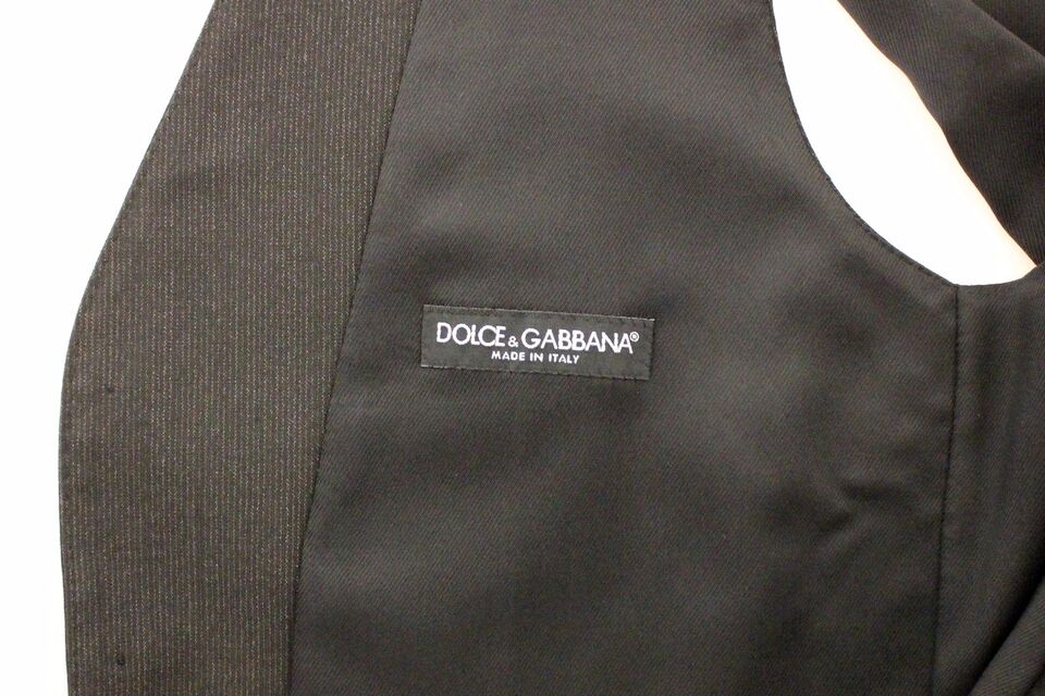 Veste en laine gris stretch de Dolce & Gabbana, blazer élégant pour homme avec design ajusté et détails sophistiqués.