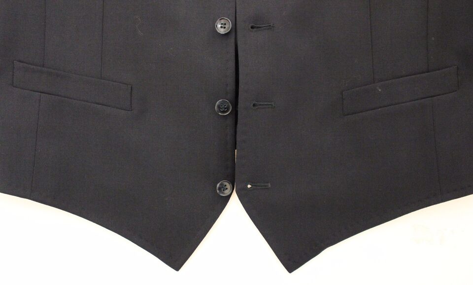Veste blazer Dolce & Gabbana en coton bleu extensible, style élégant avec coupe ajustée et détails modernes.