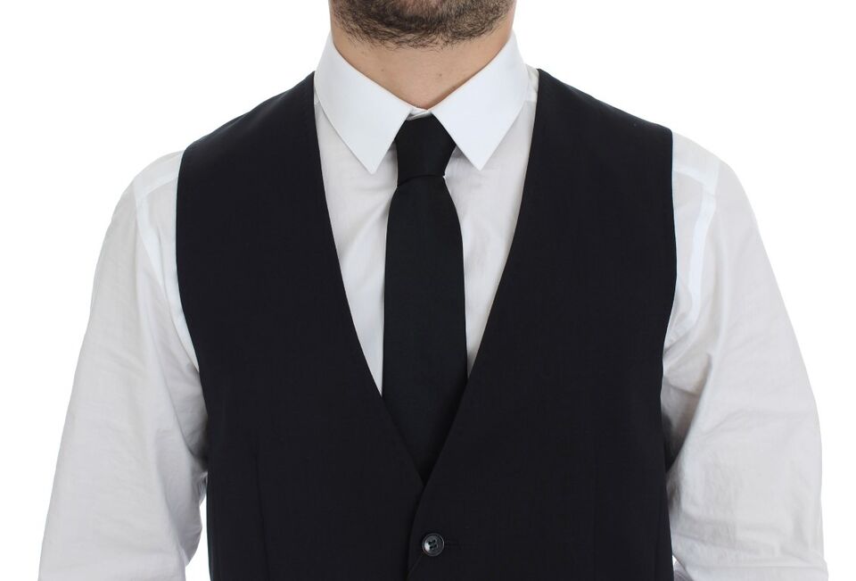 Gilet blazer Dolce & Gabbana en coton bleu, coupe ajustée et stretch, porté sur un mannequin.