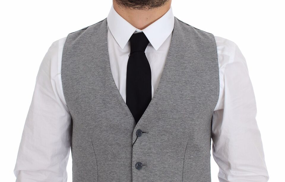 Veste blazer gris en coton stretch de Dolce & Gabbana, élégante et ajustée, parfaite pour un style sophistiqué.