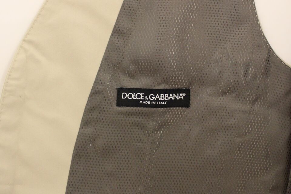 Veste blazer beige en coton stretch de Dolce & Gabbana, élégante et ajustée, pour un look sophistiqué et moderne.