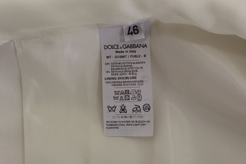 Gilet blazer blanc en coton et soie Dolce & Gabbana, détail élégant avec coupe ajustée et finition raffinée.