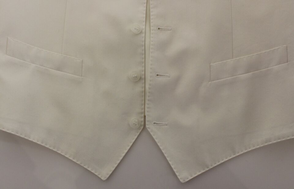 Gilet blazer blanc en coton et soie Dolce & Gabbana, veste élégante avec col et boutons, porté sur une mannequin.