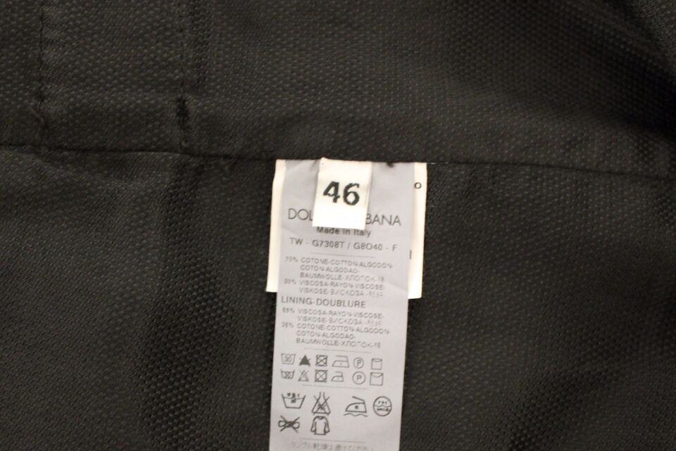 Veste blazer noire en coton viscose de Dolce & Gabbana, style élégant avec coupe ajustée et détails modernes.