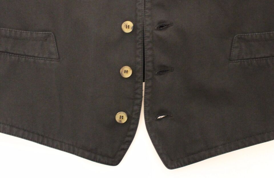 Veste blazer Dolce & Gabbana en coton viscose noire, élégante et classique, portée sur un mannequin.