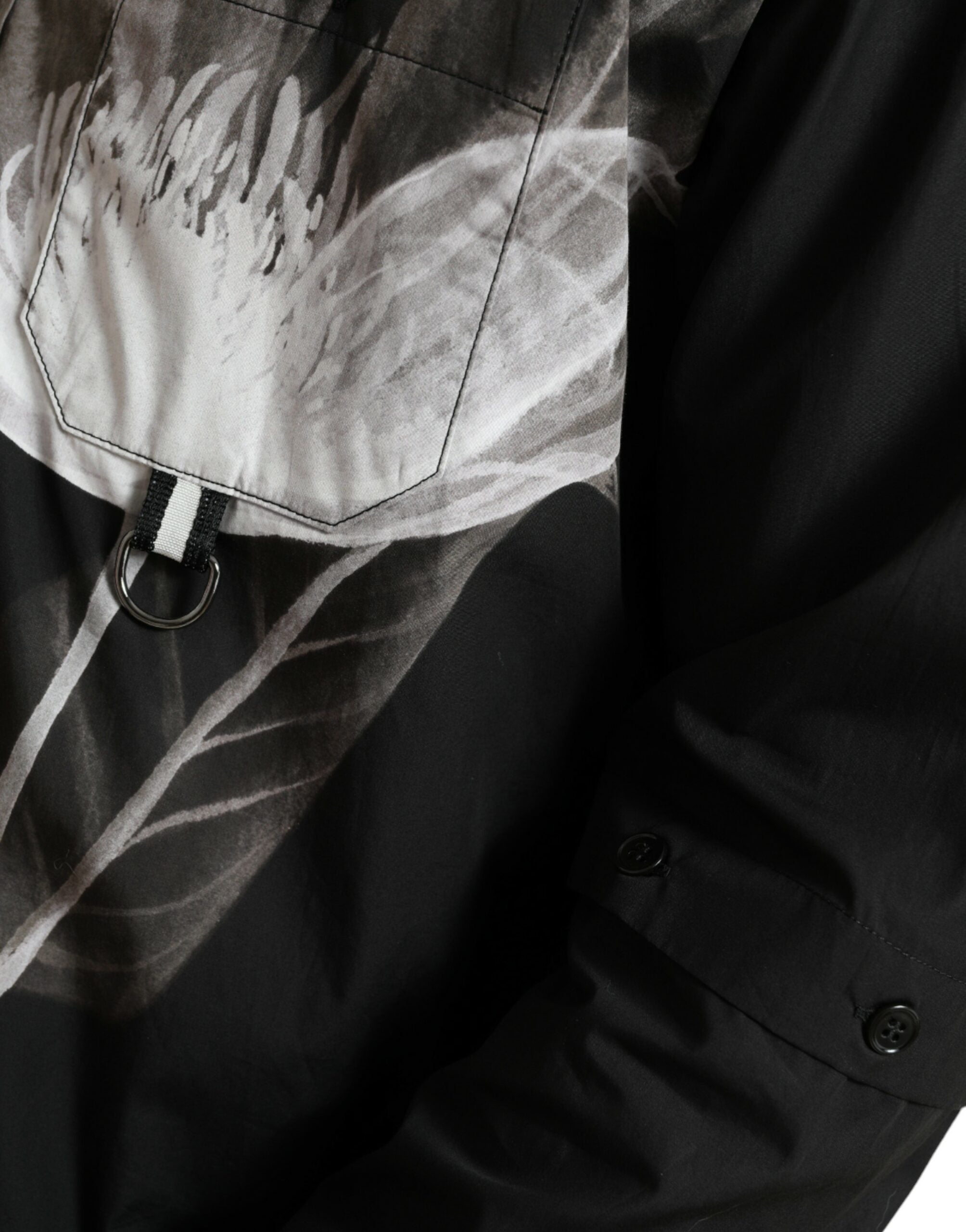 Chemise homme Dolce & Gabbana à manches longues, col en coton noir avec motifs floraux.