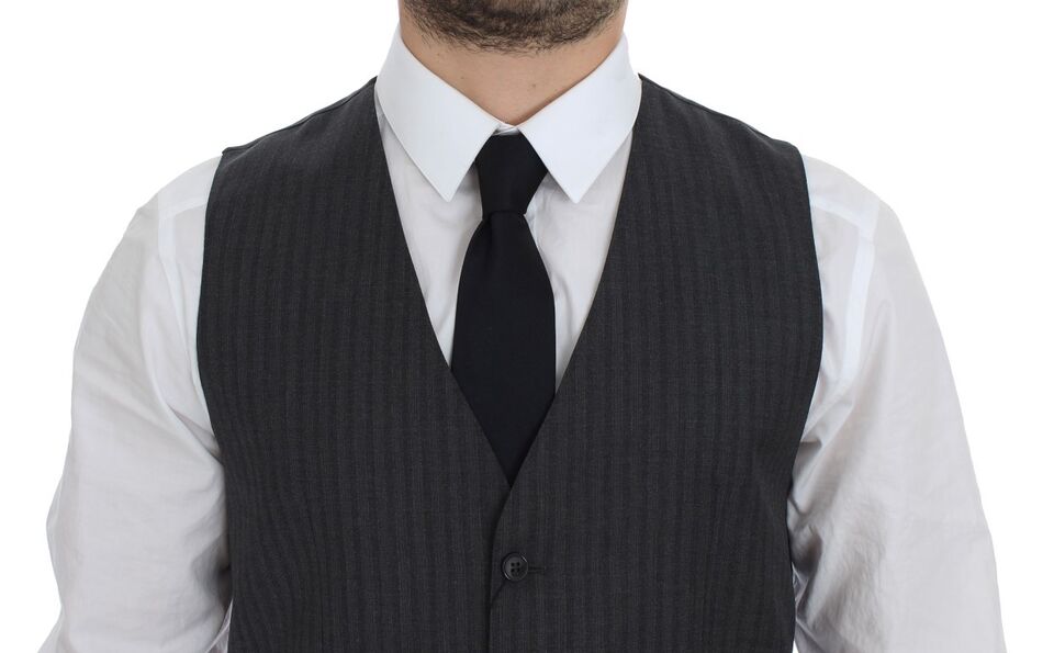 Gilet en laine noir à rayures avec boutonnage simple de Dolce & Gabbana, vue de face sur fond blanc.