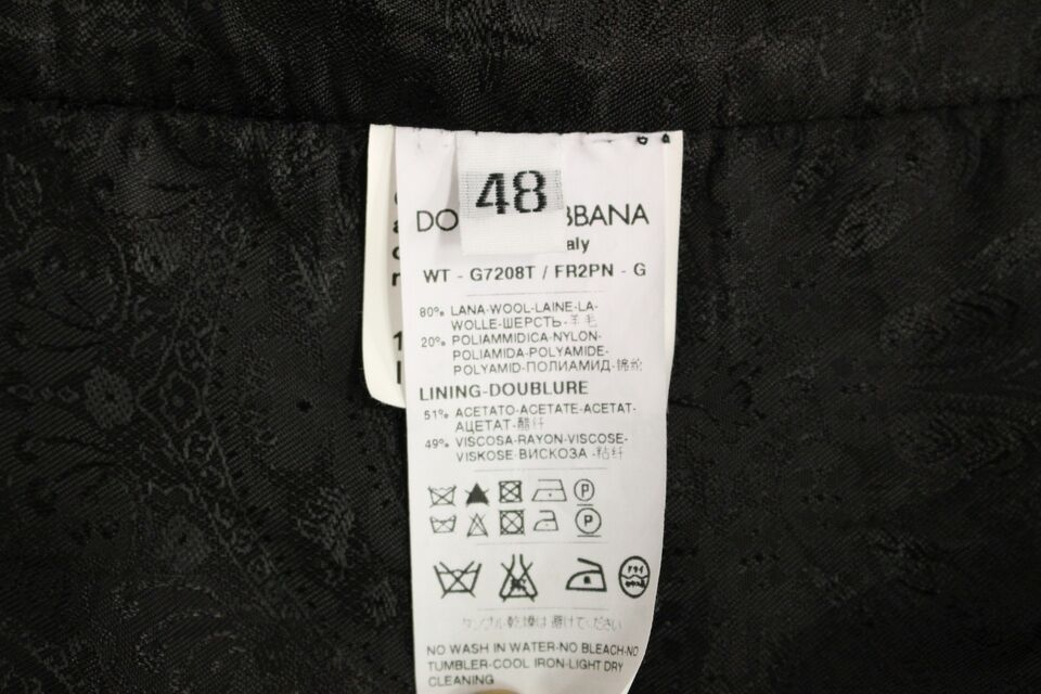 Gilet en laine noir à rayures avec logo Dolce & Gabbana, veste élégante pour homme ou femme.