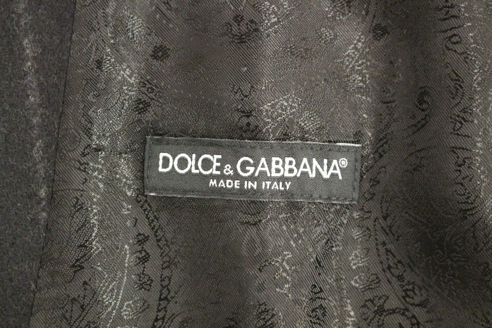 Gilet Dolce & Gabbana en laine noire à rayures avec logo, vue de face, détail élégant et moderne.
