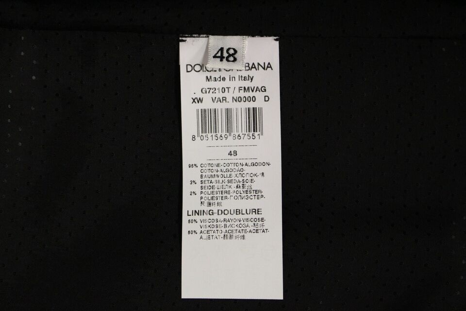 Gilet gris en coton mélangé avec logo Dolce & Gabbana, veste élégante pour homme, détail visible sur l'image.