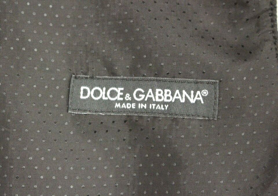 Gilet en laine mélangée gris Dolce & Gabbana avec logo, veste élégante pour homme ou femme, vue de face.