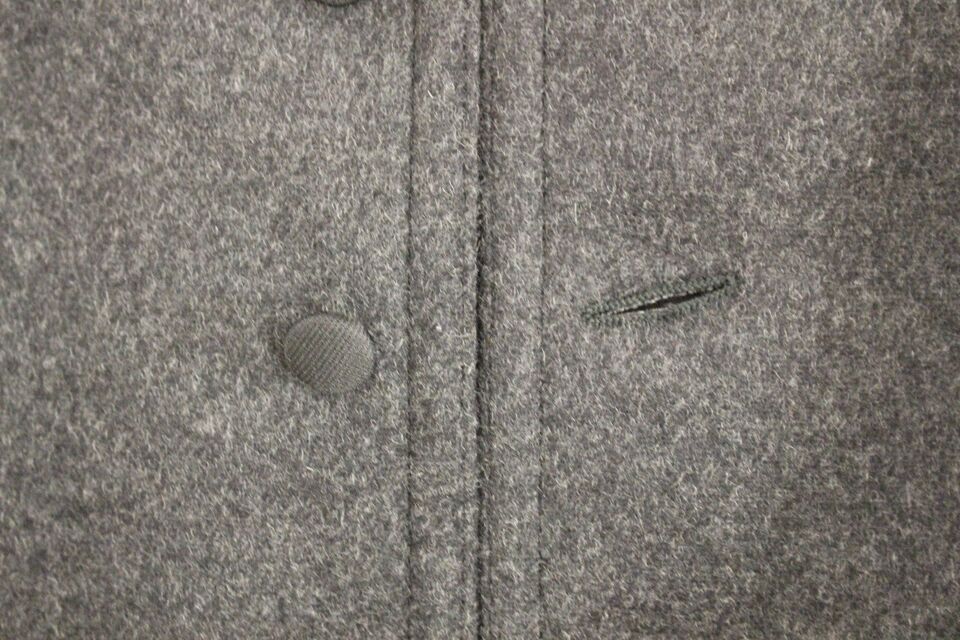 Gilet Dolce & Gabbana en mélange de laine gris avec logo, veste élégante pour homme.