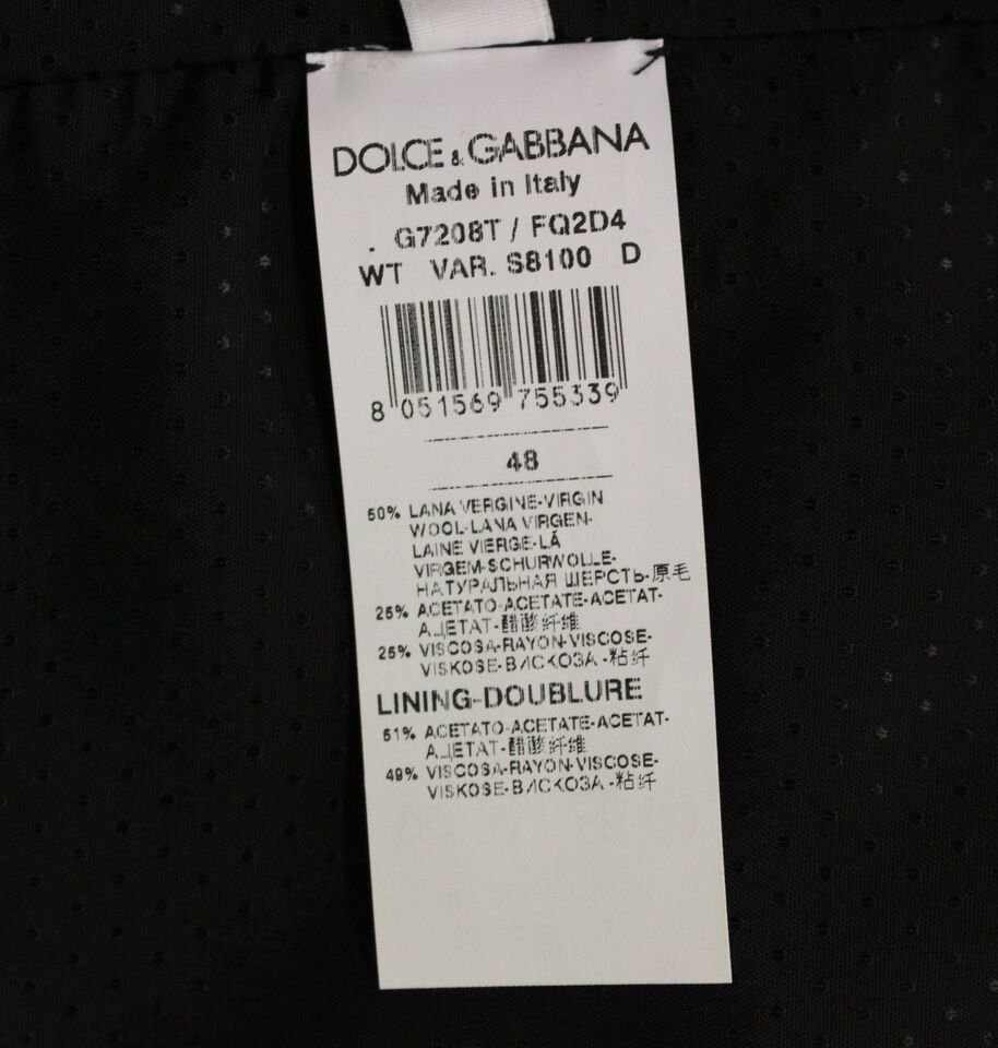 Gilet en mélange de laine gris de la marque Dolce & Gabbana, porté sur un mannequin, détails élégants et texture visible.