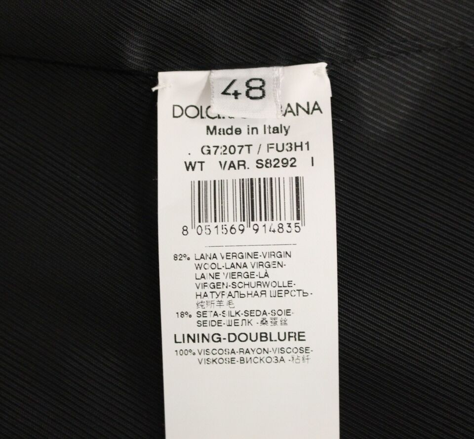 Gilet Dolce & Gabbana en laine et soie gris, sans manches, avec coupe élégante et détails sophistiqués.