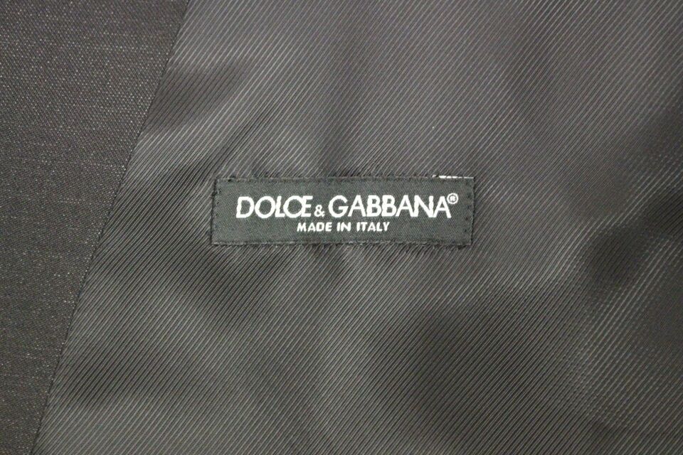 Gilet en laine et soie gris de Dolce & Gabbana, veste élégante pour homme ou femme, détails sophistiqués et finition raffinée.