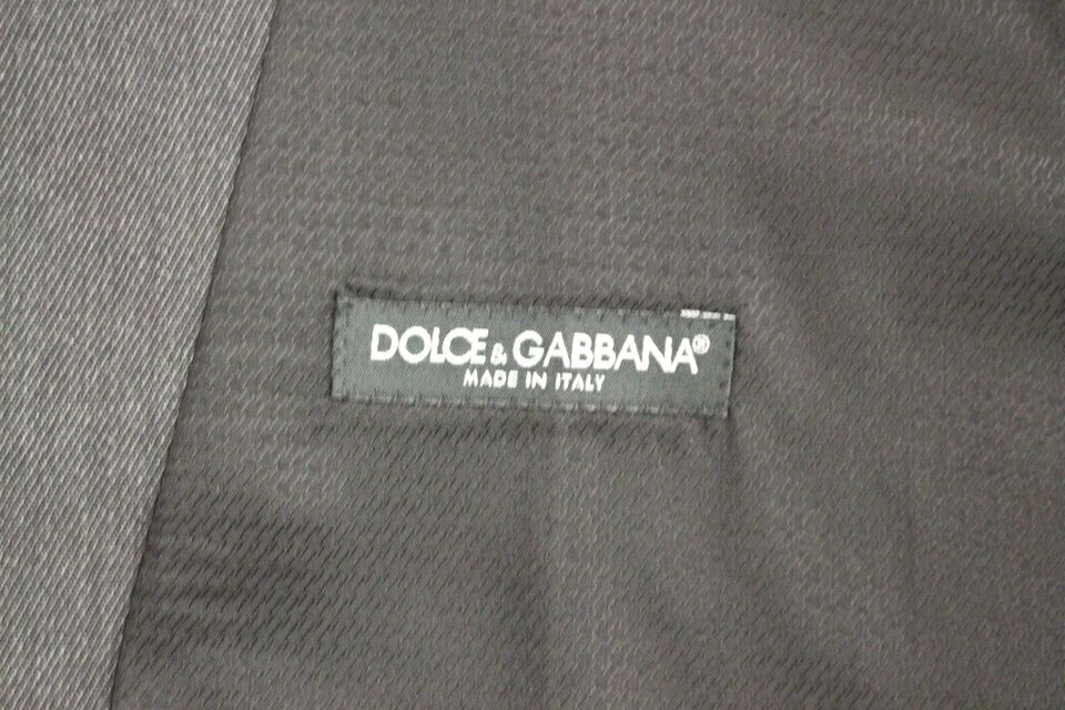 Gilet formel en laine gris de Dolce & Gabbana, veste élégante pour homme, détails sophistiqués et coupe ajustée.
