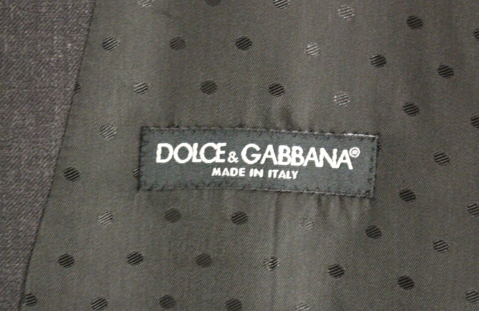 Gilet formel en laine grise de Dolce & Gabbana, veste élégante pour homme ou femme, détail classique et sophistiqué.