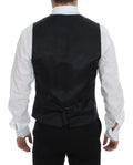 Gilet en laine gris à rayures de Dolce & Gabbana, à boutonnière simple, porté sur un mannequin.