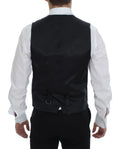 Gilet en laine gris à rayures Dolce & Gabbana, à simple boutonnage, porté sur un mannequin.