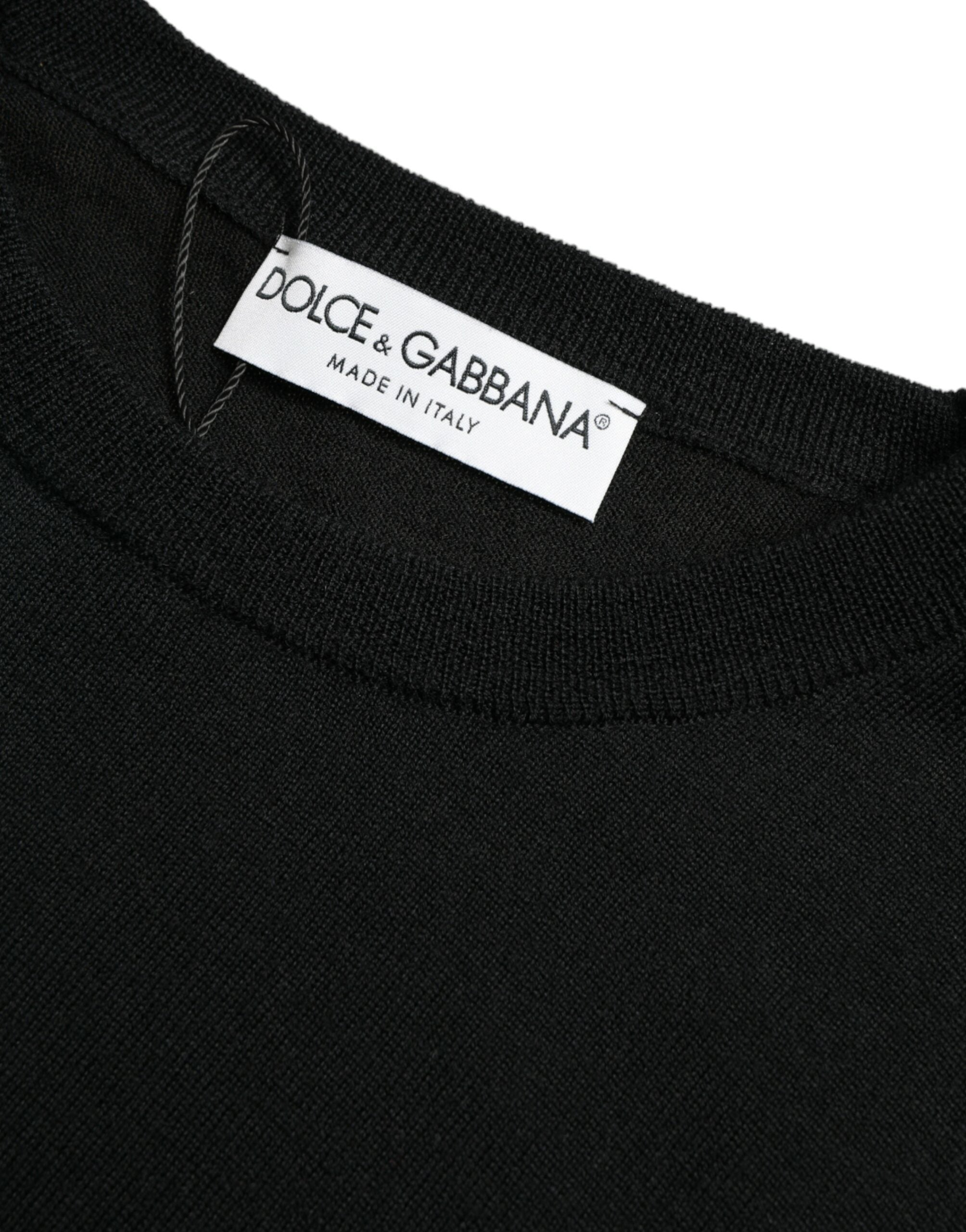 Pull Dolce & Gabbana en laine noire à col rond, vêtement élégant pour homme, visible en détail sur l'image.