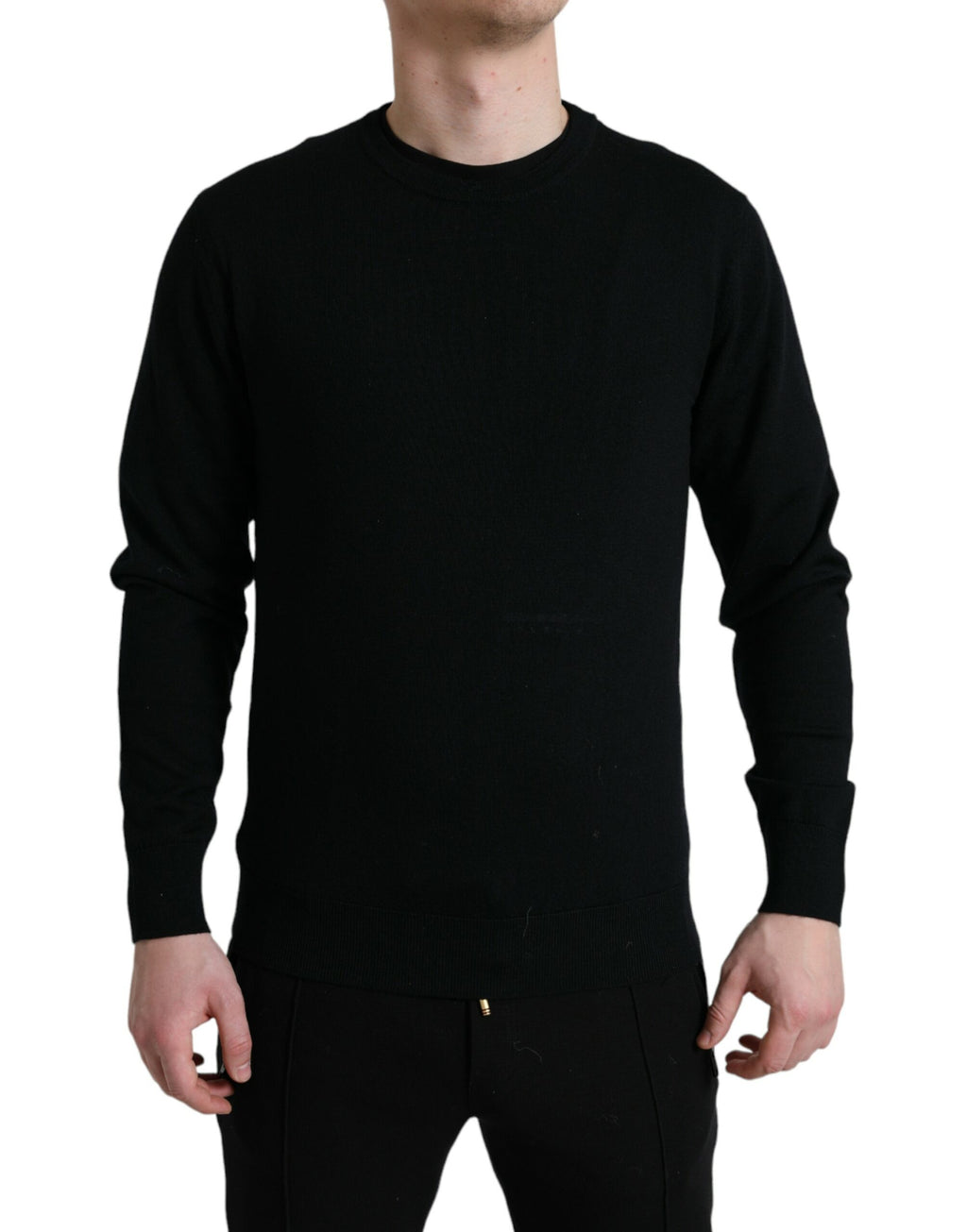 Pull en laine noir Dolce & Gabbana à col rond, vue de face, détails du tissu et coupe élégante visible.